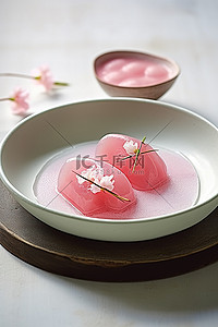 茶背景图片_一个空盘子，上面有粉色果冻