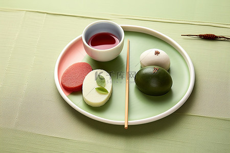 空盘子背景图片_一个空盘子，上面有三种不同的甜点和茶