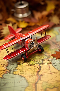 地图飞机背景图片_旧地图上有指南针的老式双翼飞机