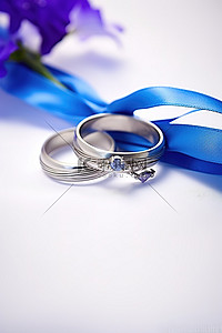 蓝紫色花背景图片_蓝绳和紫色花下的结婚戒指