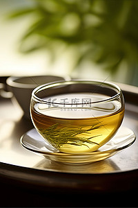 绿茶背景图片_一壶绿茶和一个碟子