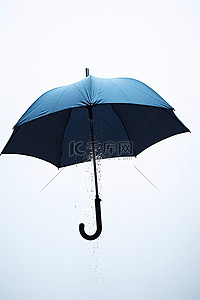 伞背景图片_白色背景上的蓝色伞水