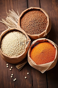 小米背景图片_木桌上三篮红扁豆糙米小米种子和有机物