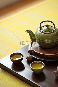 茶杯子背景图片_茶壶和小杯子围绕着碗