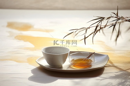 竹子背景图片_托盘上放着一碗茶，上面有竹子的图案