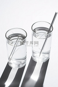透气吸水背景图片_两个玻璃杯，上面有两根小吸管