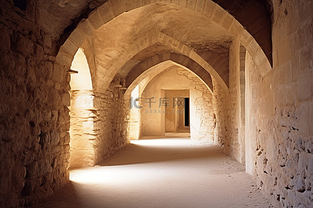 拱形背景图片_一座古城堡中的拱形石拱形通道