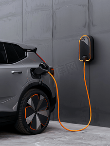 科技汽车摄影照片_新能源汽车充满电拔出充电器
