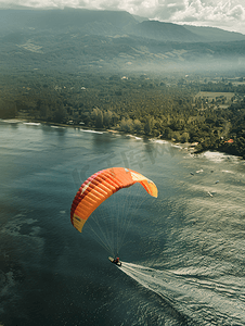 冲浪海上摄影照片_巴厘岛海龟岛上海上降落伞运动摄影图