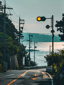 日本镰仓小清新海边马路红绿灯摄影图