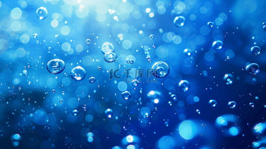 气泡的水背景图片_闪烁着气泡的蓝色的水背景