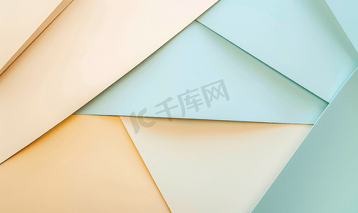 柔和的棕色蓝色和米色颜色的抽象几何纸背景