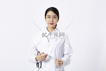 医生医院女性办公室看病摄影图配图