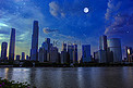 广州珠江双子塔广州美术馆月夜摄影图配图
