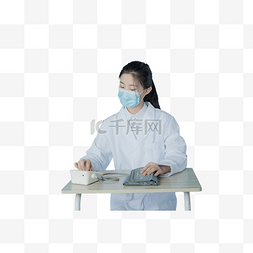 女医护人员坐着按电子血压仪真人