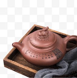 茶具禅意图片_木纹桌子上的紫砂壶