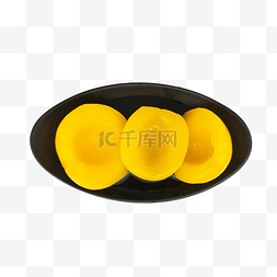 黄黑色图片_黑色盘子黄桃