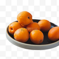 水果黑盘子里的黄杏