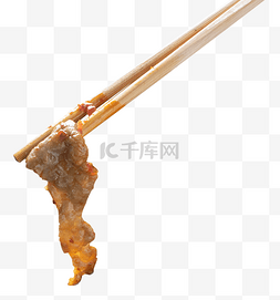 夹肉夹图片_筷子夹肥牛卷火锅