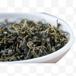 绿茶茶叶图片_白色盘子里的绿茶茶叶
