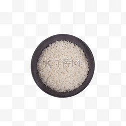 米饭稻谷图片_黑色的陶瓷碗里装着大米