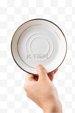 双手白色图片_手拿白色餐具盘子