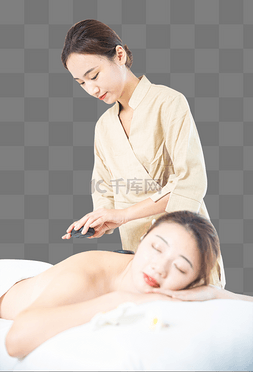 按摩背部图片_按摩美容技师美女背部放磁石