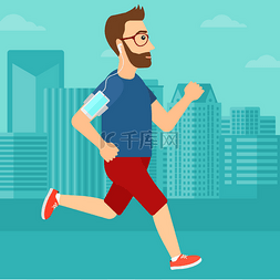 smartphone图片_Man jogging with earphones and smartphone.