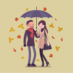 秋天在伞下的年轻幸福夫妇