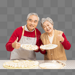 除夕在厨房里包饺子的老年夫妻