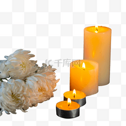 清明清明节祭奠蜡烛和白色菊花