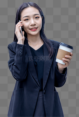 商业人物图片_职场女性手拿咖啡打电话