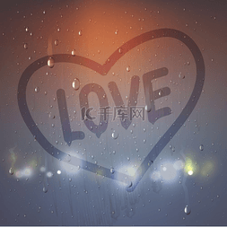 闪亮的爱心图片_在有雾的玻璃构成的爱心。