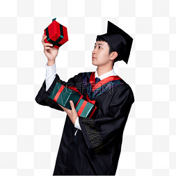 毕业生帽图片_拿着礼物盒看的毕业生