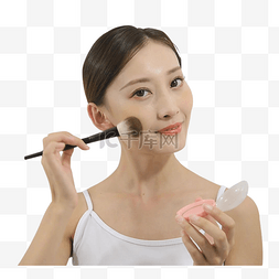 正在化妆的女人图片_正在化腮红的美女