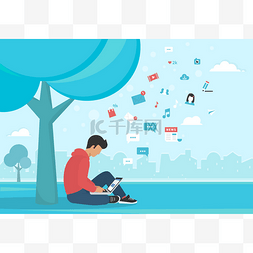 发电子邮件图片_年轻男子坐在一棵树下公园和使用