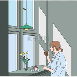 by图片_A woman is sitting by the window drinking cof