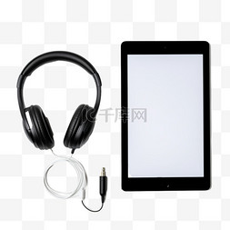 黑色iPad和有线耳机的平铺照片