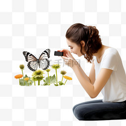 女人在一朵花上拍摄一只蝴蝶