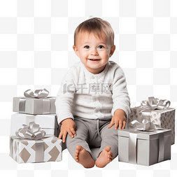 人在装饰圣诞树图片_小男孩坐在装饰着礼物和礼物的圣