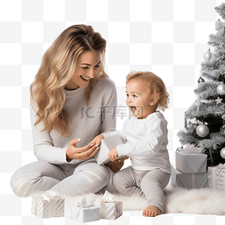 妈妈和宝宝在圣诞树周围装饰和玩