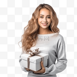 美丽的年轻女孩拿着礼物站在圣诞
