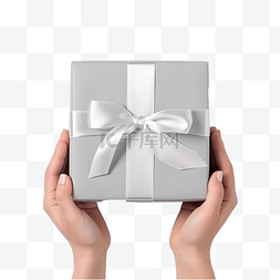 包装礼盒图片_女手握着圣诞银白包装礼盒