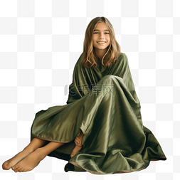 毯子图片_坐在圣诞树旁的女孩用毯子包裹双