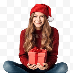 礼盒礼盒k图片_一个戴着圣诞老人帽子的女孩坐在