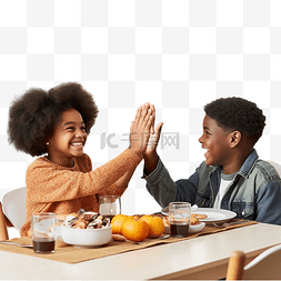 美国家庭图片_感恩节午餐期间，快乐的非洲裔美