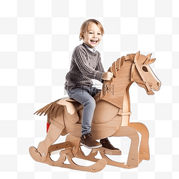 小男孩在圣诞树附近骑着纸板马