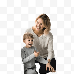 房间里的母图片_快乐的母亲和儿子在装饰节日的房