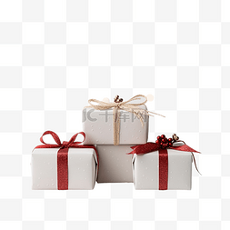 红色的圣诞礼盒图片_用白色牛皮纸和装饰红丝带包裹的