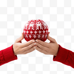 球衣服图片_戴着针织手套的女性手中的圣诞球